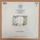 Chris Rea – New Light Through Old Windows (The Best Of Chris Rea) – Vinyl LP Record - Very-Good+ Quality (VG+)