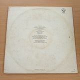 Genesis ‎– Selling England By The Pound (SA) – Vinyl LP Record  (VG-)