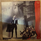 Kim Carnes ‎– Mistaken Identity - Vinyl LP Record - Opened  - Very-Good- Quality (VG-) - C-Plan Audio