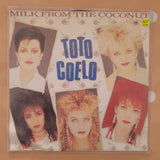 Toto Coelo ‎– Milk From The Coconut - Vinyl 7" Record - Very-Good+ Quality (VG+) - C-Plan Audio