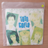 Toto Coelo – Milk From The Coconut - Vinyl 7" Record - Very-Good+ Quality (VG+) (verygoodplus)