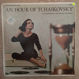 The International Philharmonic Orchestra ‎– An Hour Of Tchaikovsky - Vinyl LP Record - Opened  - Very-Good Quality (VG) - C-Plan Audio